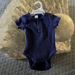 A 3-6 mo blue short sleeve shirt